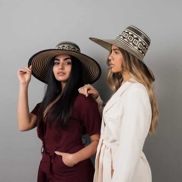 Taw women wearing Black wide brim straw hat