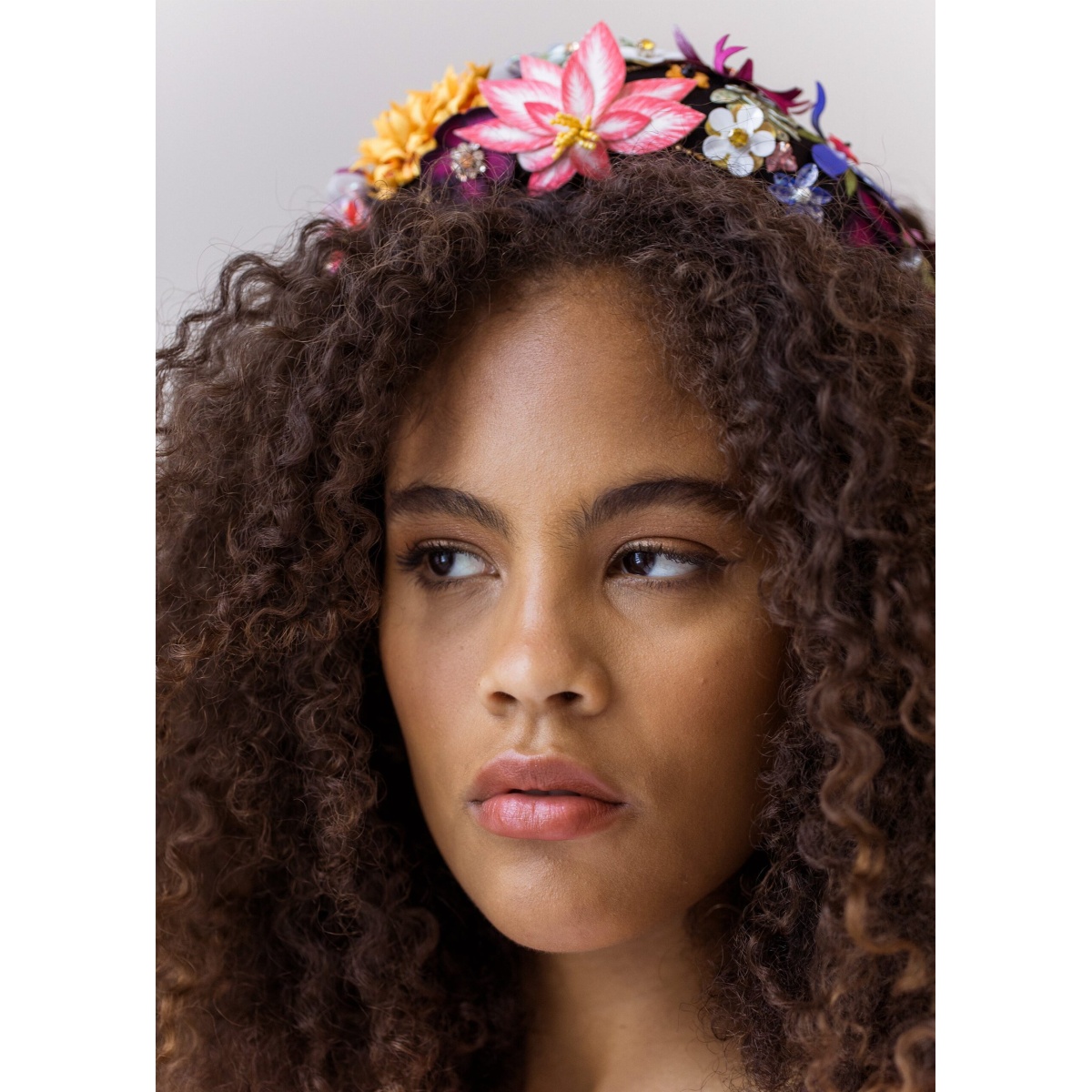 The Alida Headband is made by hand in New York of hand-painted fabric