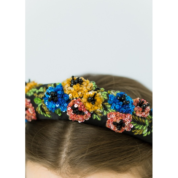 The Elia Headband is made by hand in New York of embroidered sequin flower embellishment