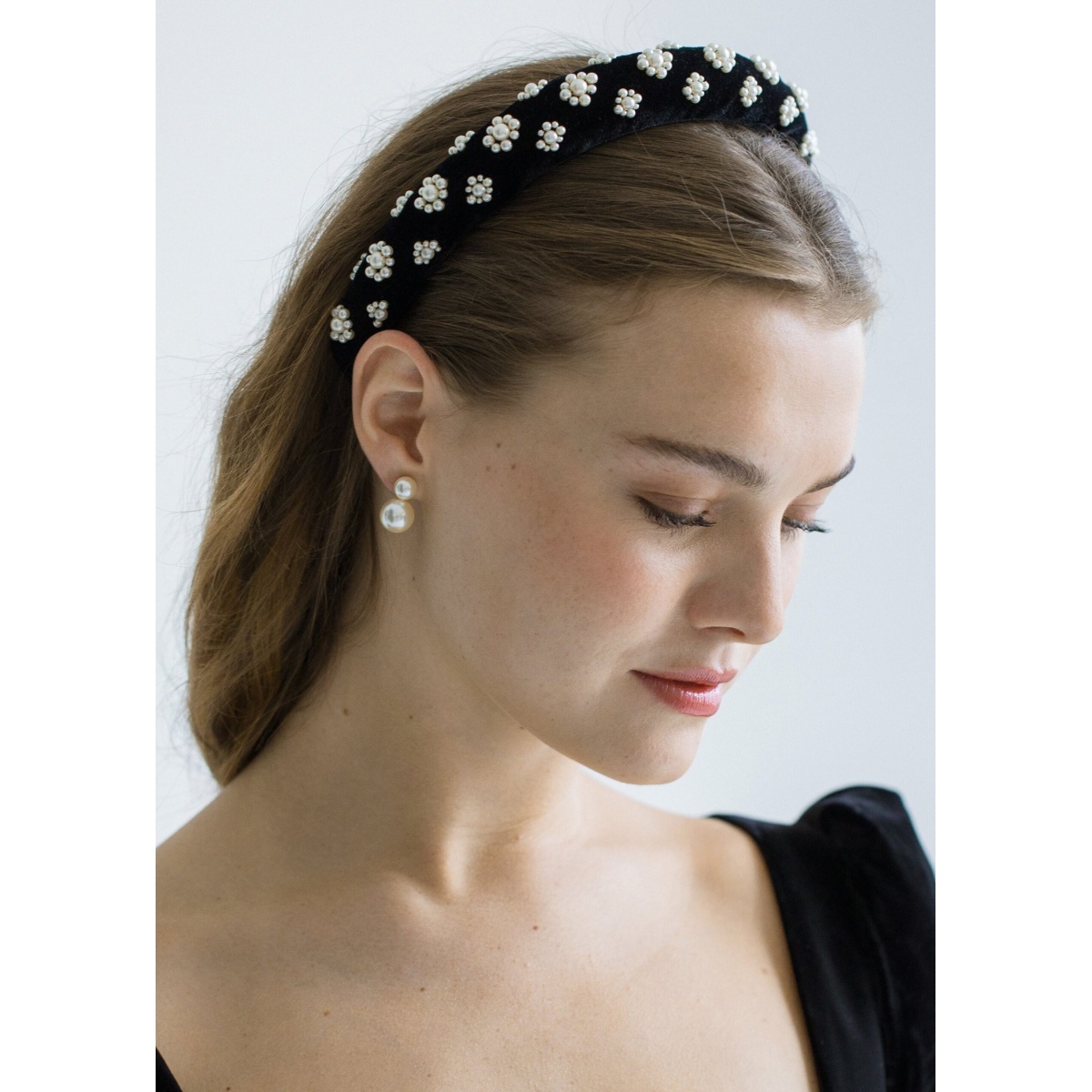 The Margaret Headband is made by hand in New York of embroidered pearl embellishment