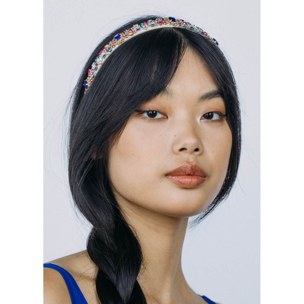 The Mira Headband is crafted in New York from hand-embroidered crystals