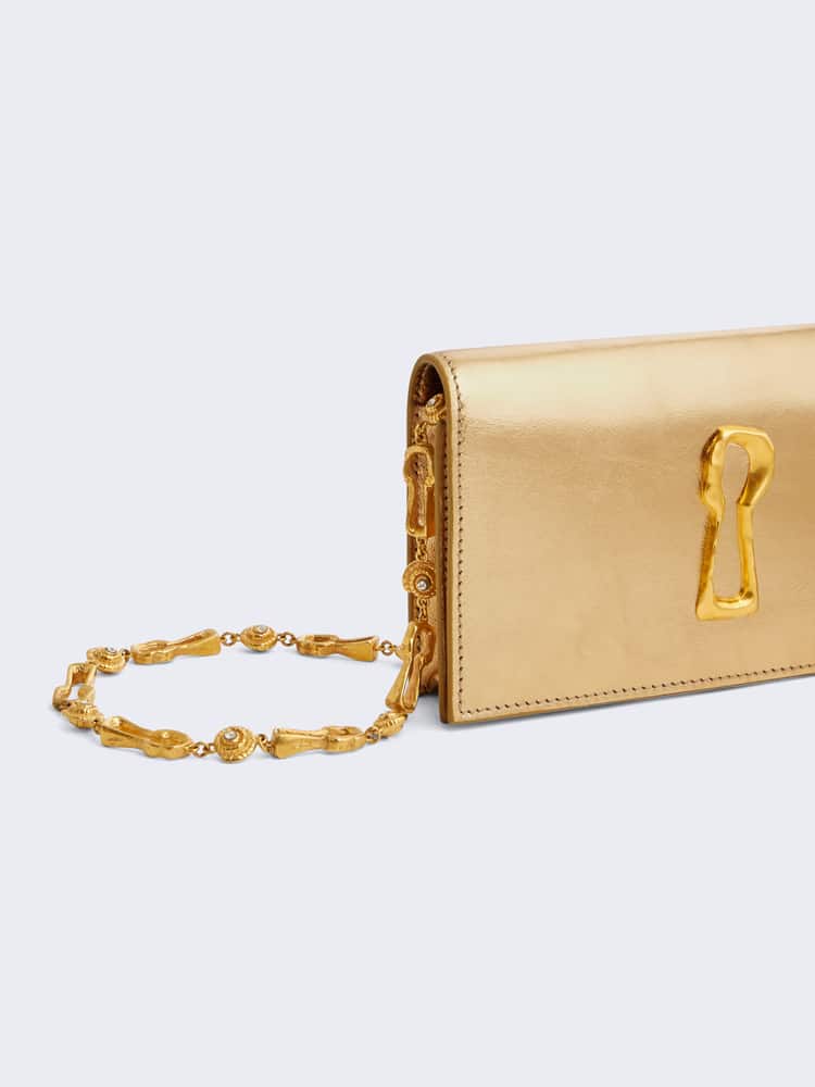 Schiaparelli Leather Keyhole Clutch Haute Couture Designer Coveti