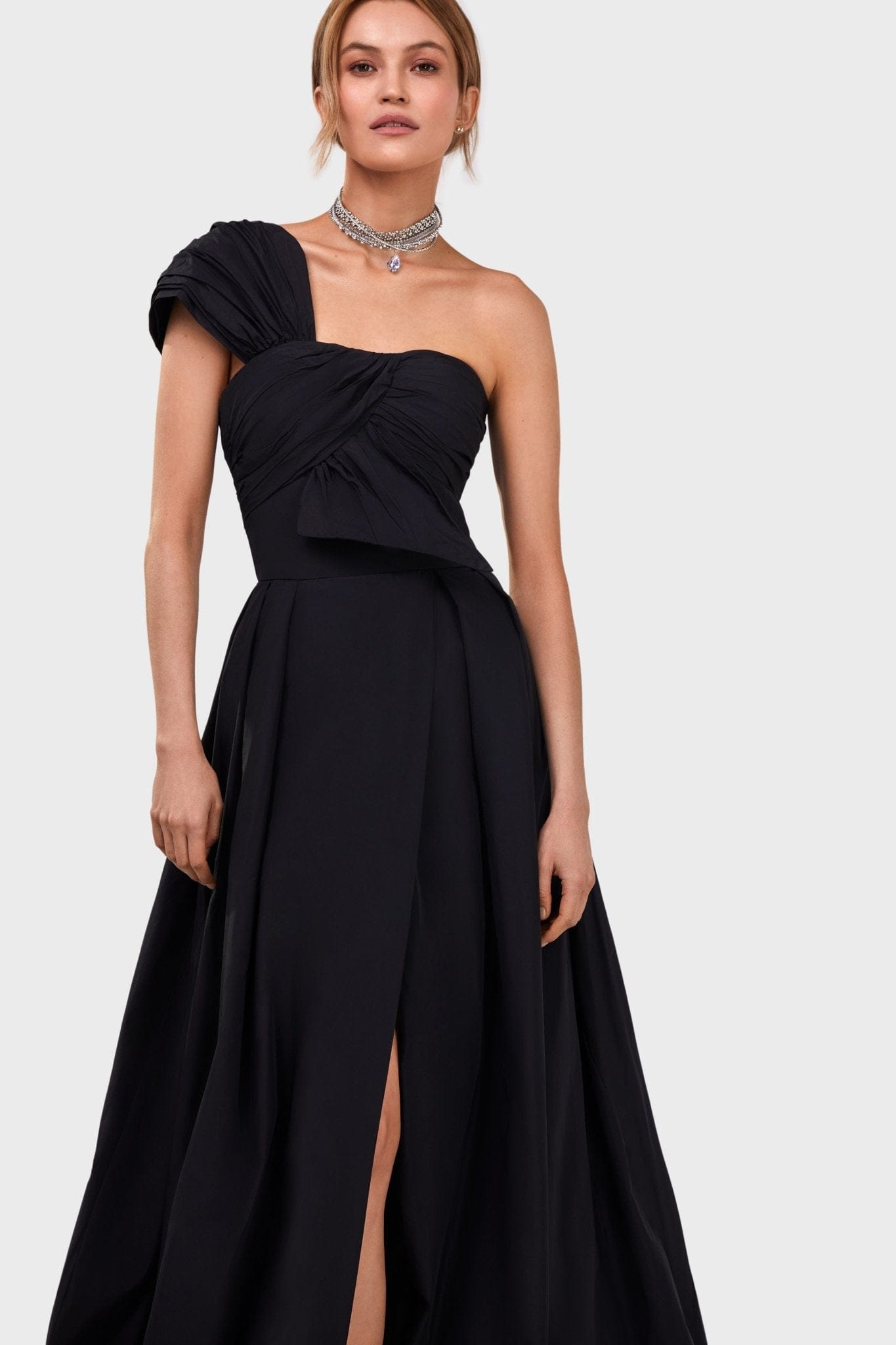 Milla Black taffeta evening gown with a high slit and one shoulder wrap top Coveti