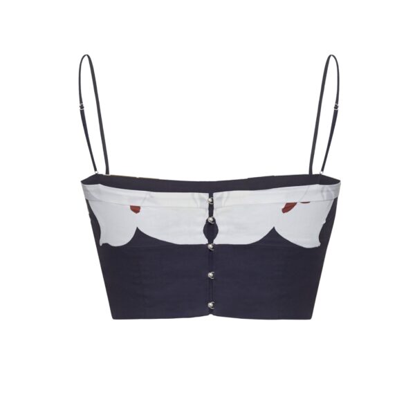 the Bex Top showcases this season’s Sicily-inspired floral motif. The cropped silhouette offers a modern fit