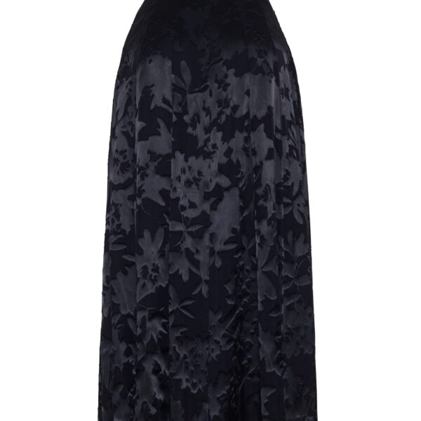 and features an intricate floral design. The classic black hue