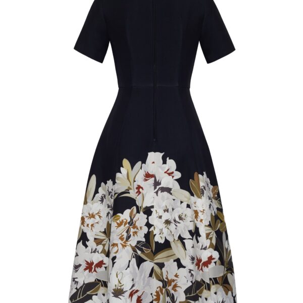 the Evangeline Dress is crafted in luxurious printed silk wool adorned with this season’s Sicily-inspired floral motif. Designed with an A-line silhouette and a gently flared skirt
