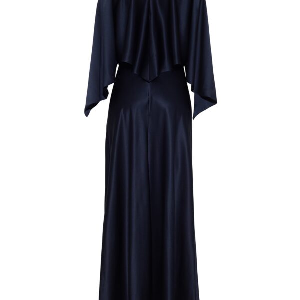 featuring a detachable capelet for versatile wear. The top and dress are easily separable