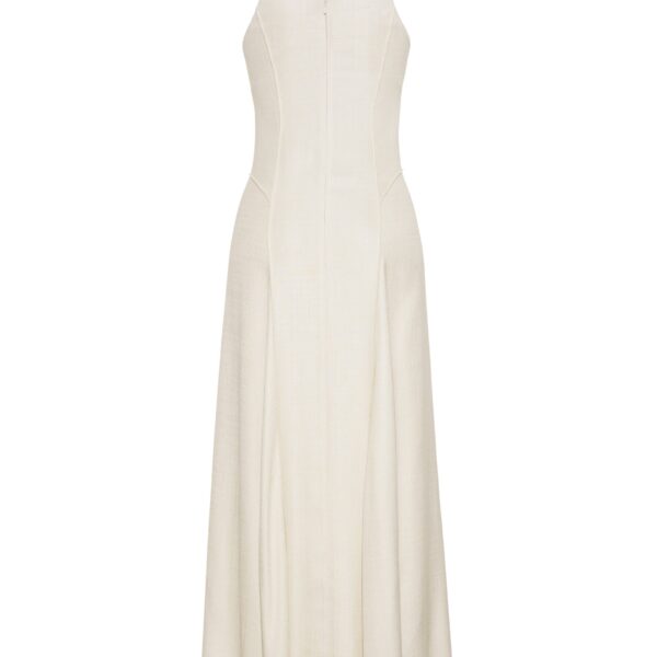 the Shay dress features a structured silhouette with a softly contoured waistline and fluid