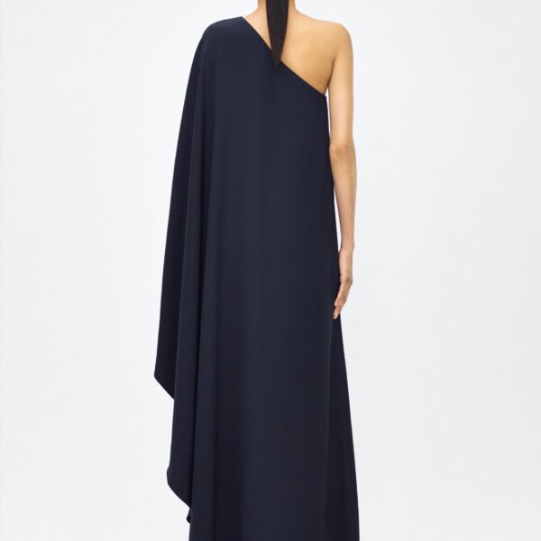 Adam Lippes P25 Collection; The Solene Dress is a striking one-shoulder design crafted from luxurious silk crepe. The fabric drapes gracefully