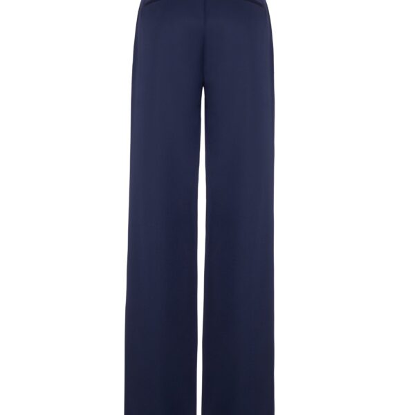 now rendered in lightweight tropical wool. Cut in a deep navy hue
