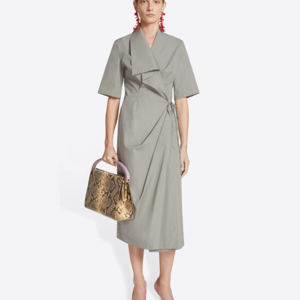 with draping and side tie closure.