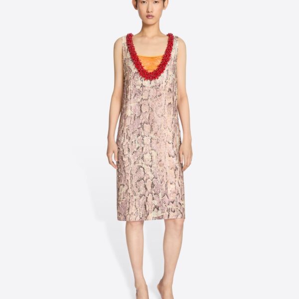 fully embellished with snake print sequins.