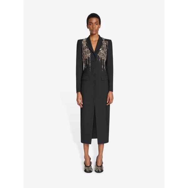 in embellished wool mohair twill.