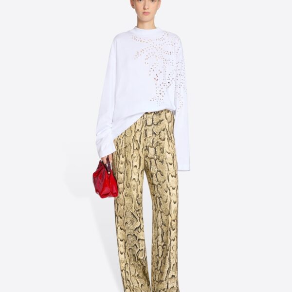 with lasered embroidery.