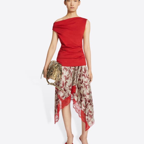 with draping and waist pleats.