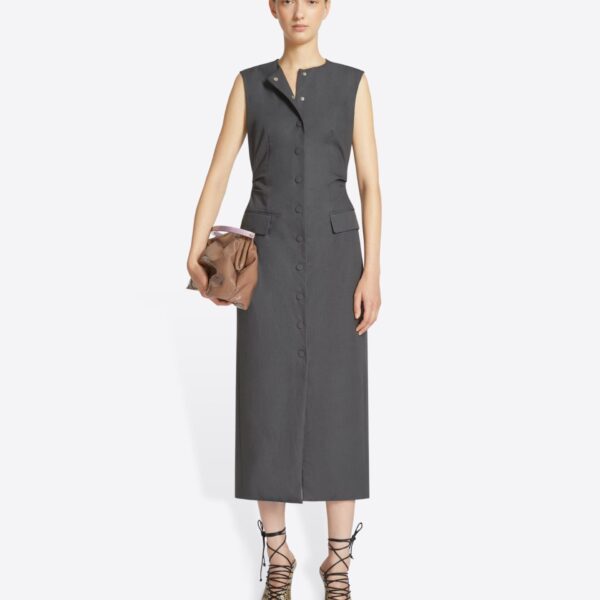 with pockets and belt at the back.
