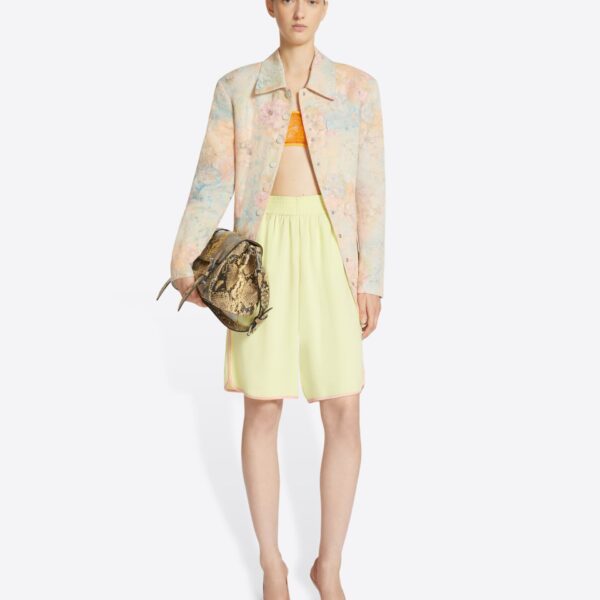in fluid crepe satin.