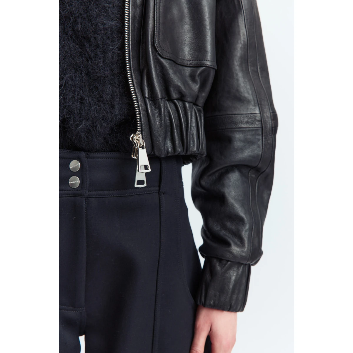 16Arlington Black Jackets with The Cie Jacket is a cropped and slightly fitted bomber cut from supple leather