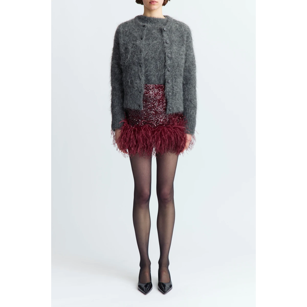 offering rich depth and a subtle shimmer. Cut to fall high above the knee