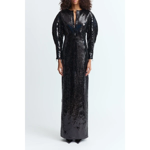floor-length silhouette cut from black sequins with a subtle