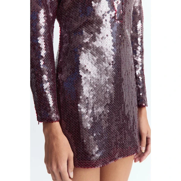 long sleeved silhouette in deep burgundy sequins