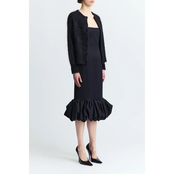 and subtle texture. Cut in a gently relaxed shape