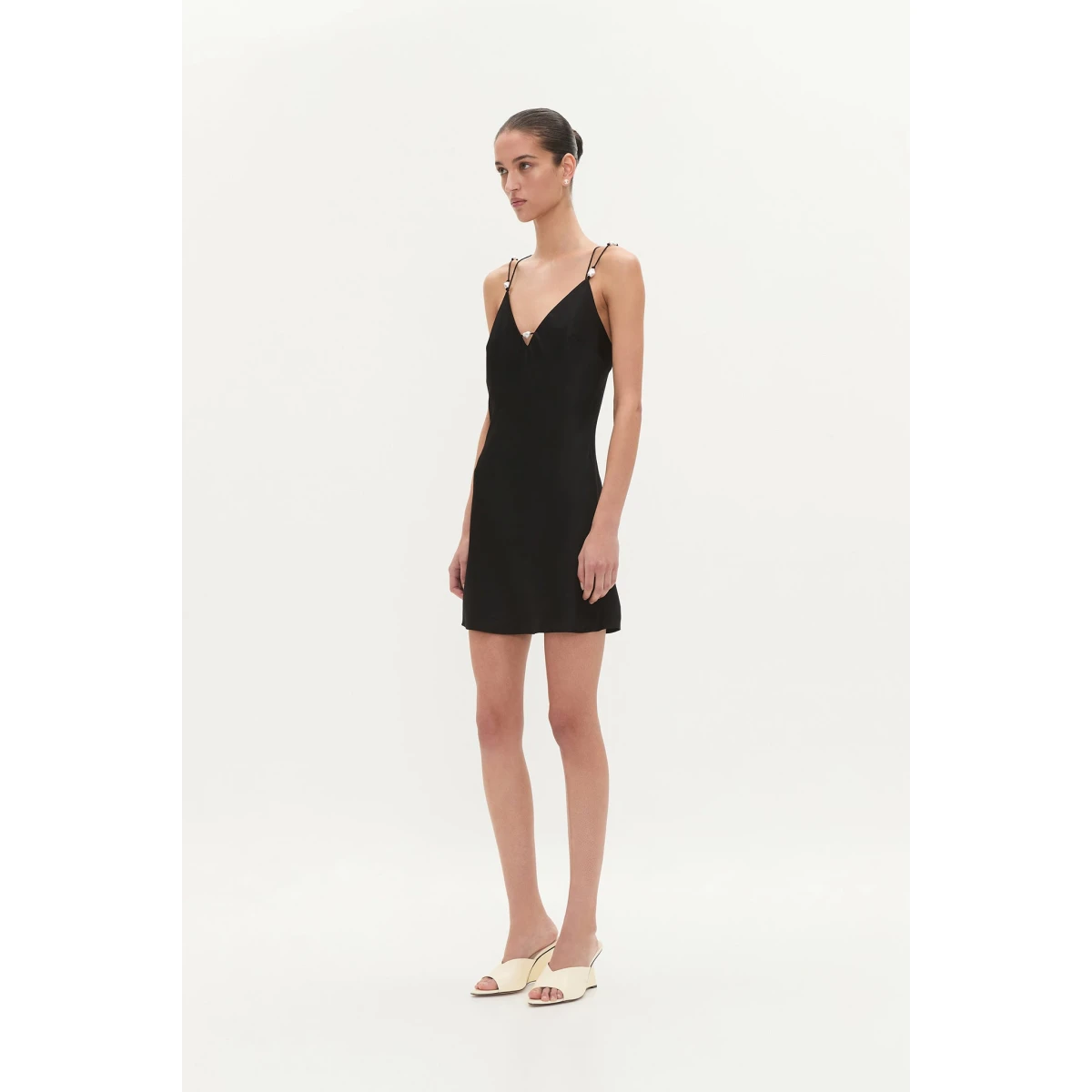 Aje Aus Dresses – structured silhouette with raw femininity from Coveti
