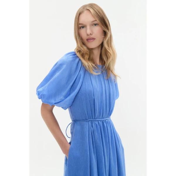 Aje Aus Dresses – structured silhouette with raw femininity from Coveti