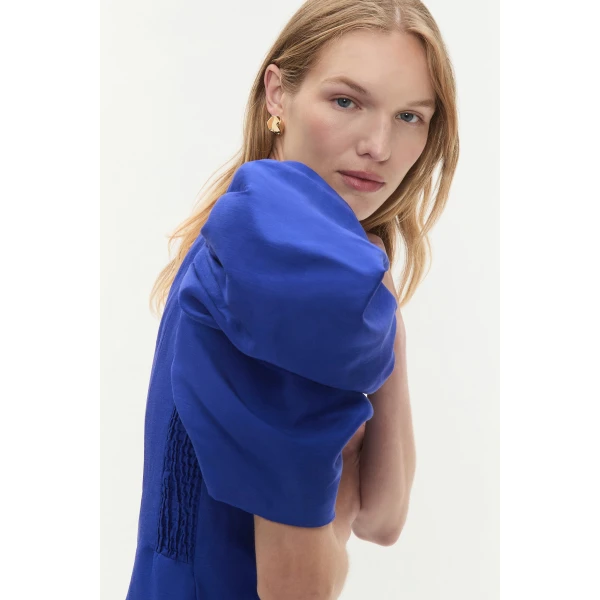 Aje Aus Dresses – structured silhouette with raw femininity from Coveti