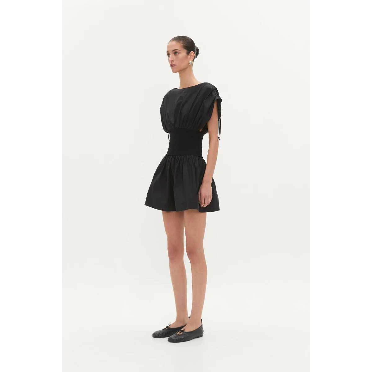 Aje Aus Dresses – structured silhouette with raw femininity from Coveti