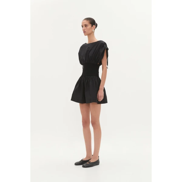 Aje Aus Dresses – structured silhouette with raw femininity from Coveti