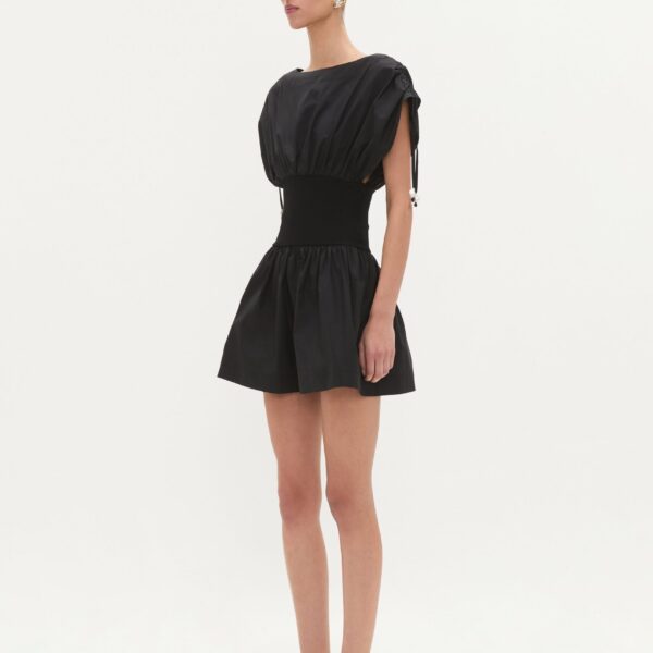Aje Aus Dresses – structured silhouette with raw femininity from Coveti