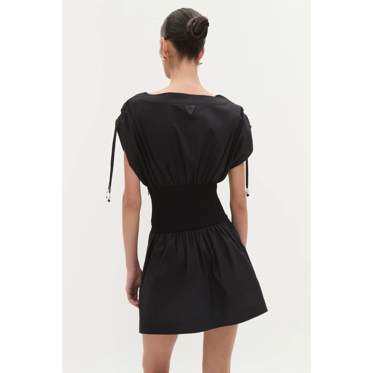 Aje clothing Aus Dresses – structured silhouette with raw femininity from Coveti