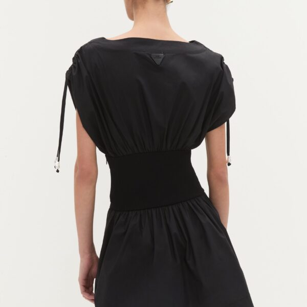 Aje clothing Aus Dresses – structured silhouette with raw femininity from Coveti