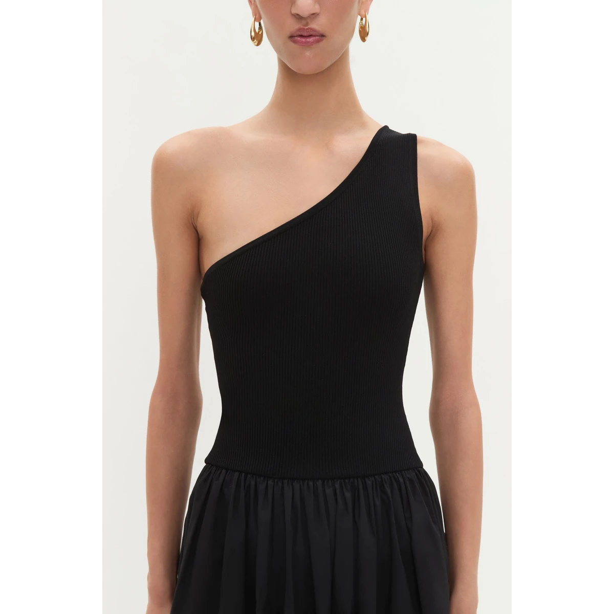 Aje Aus Dresses – structured silhouette with raw femininity from Coveti