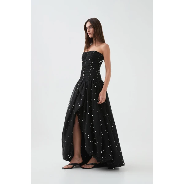 Aje Aus Dresses – structured silhouette with raw femininity from Coveti