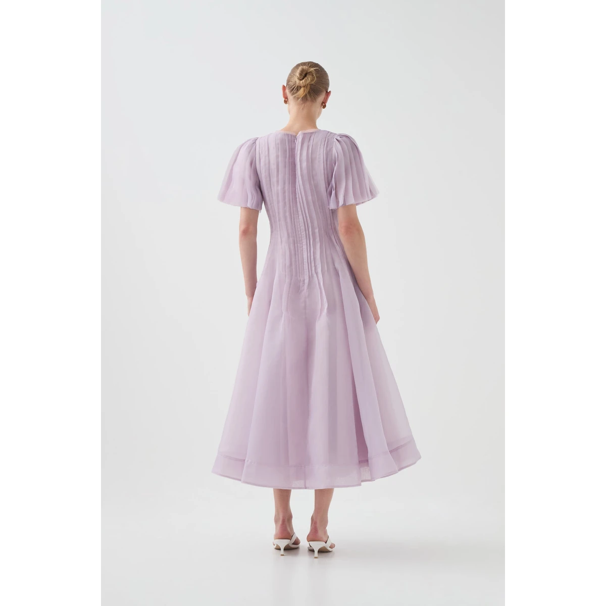 Aje Aus Dresses – structured silhouette with raw femininity from Coveti