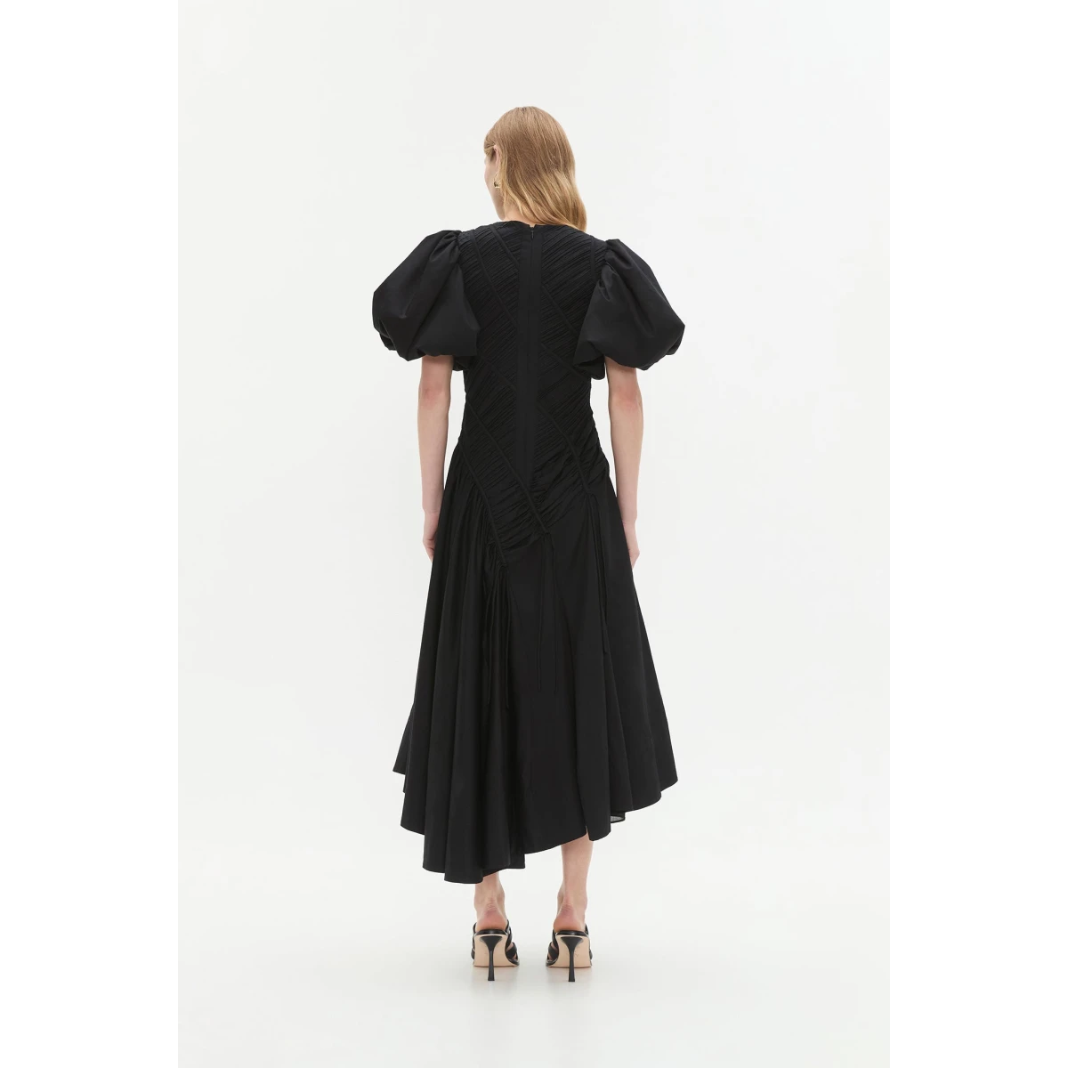 Aje Aus Dresses – structured silhouette with raw femininity from Coveti