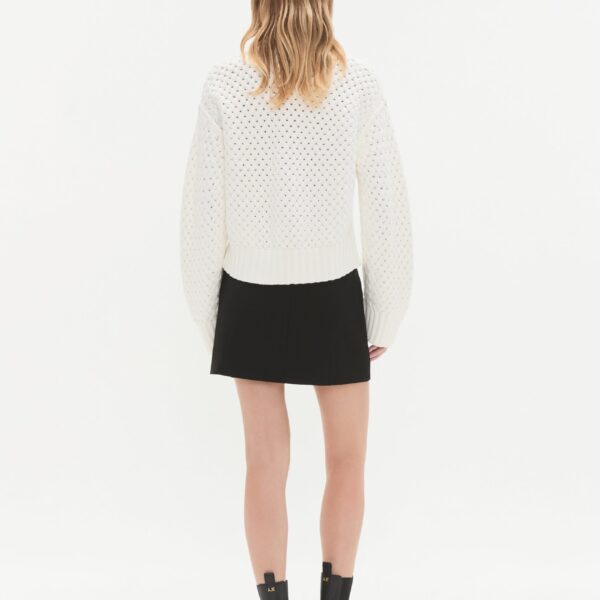 Aje clothing Aus Knitwear – structured silhouette with raw femininity from Coveti