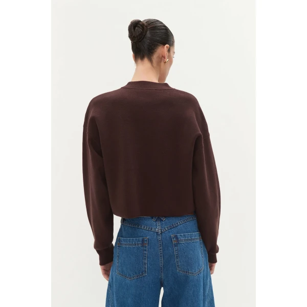 Aje clothing Aus Knitwear – structured silhouette with raw femininity from Coveti