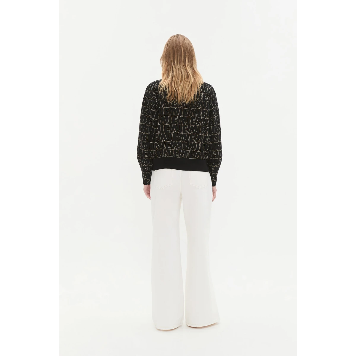 Aje clothing Aus Knitwear – structured silhouette with raw femininity from Coveti