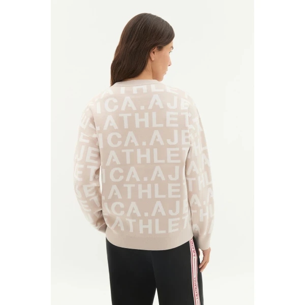 Aje Aus Knitwear – structured silhouette with raw femininity from Coveti