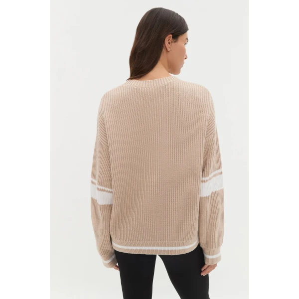 Aje Aus Knitwear – structured silhouette with raw femininity from Coveti