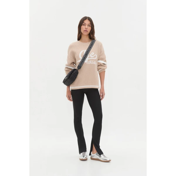 Aje clothing Aus Knitwear – structured silhouette with raw femininity from Coveti