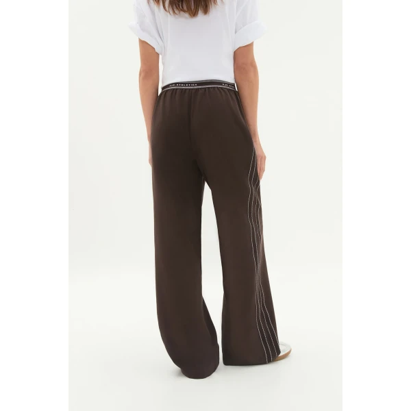 Aje Aus Pants – structured silhouette with raw femininity from Coveti