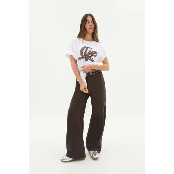 Aje clothing Aus Pants – structured silhouette with raw femininity from Coveti