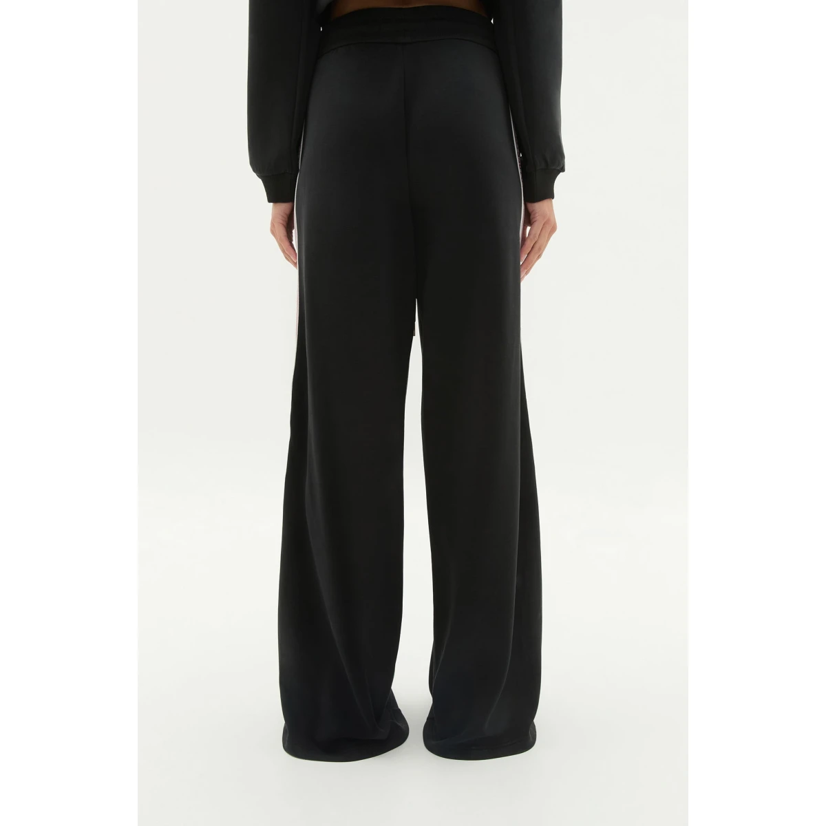 Aje Aus Pants – structured silhouette with raw femininity from Coveti