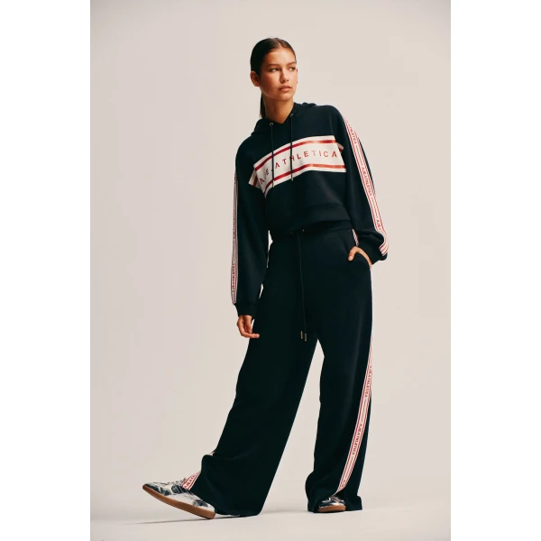 Aje clothing Aus Pants – structured silhouette with raw femininity from Coveti