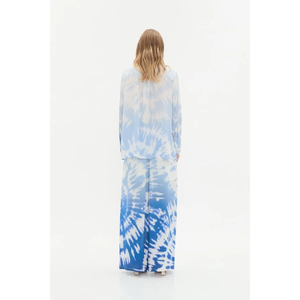 Aje Aus Tops – structured silhouette with raw femininity from Coveti