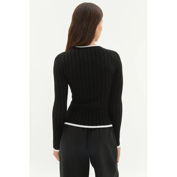 Aje Aus Tops – structured silhouette with raw femininity from Coveti